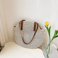 Borsa tote in paglia beige con spalline in pelle marrone e design curvo intrecciato - Bianco