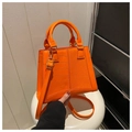 Fashionable bright orange PU leather crossbody bag with crocodile texture and top handle - Orange