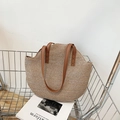 Grande borsa tote in paglia intrecciata con manici in pelle marrone in stile minimal - Marrone
