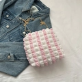 Pink and white striped bubble tote bag with gold chain strap on denim jacket - Pink