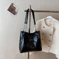 Black glossy tote bag with fashion tag and silver chain strap for women casual wear - Black