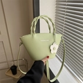 Bolso cubo minimalista verde claro con adorno de flor y asa trenzada para mujer - Verde