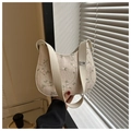 Dettaglio ravvicinato della borsa a spalla in paglia con ricamo floreale verde e pelle - Bianco Sporco
