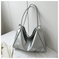 Detail view of the metallic silver tote bag with shiny PU leather and soft texture - Silver No Pendant