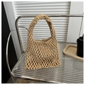 Handmade hollow mesh cotton rope wrist bag in a natural light beige woven finish - Khaki