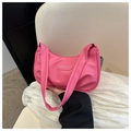 Detail of a pink crescent shoulder bag with ruched texture and fashion logo plate - Rose Pink