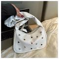 Detail showing white hobo bag with colorful rhinestones and ruched cloud handle - White