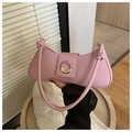 Detailed view of pink PU shoulder bag with round metallic buckle and knotted rope strap - Pink