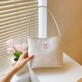Schicke cremefarbene Nylon-Umhängetasche mit rosa Stickerei und Tulpendekoration - Gebrochenes Weiß