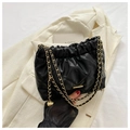 Classic black quilted shoulder bag with gold chain strap and elegant ruched texture - Black