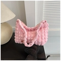 Close-up of pink puff textured tote bag with 3D bubble pleat fabric and soft handle - Pink