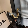 Quilted black crescent underarm bag with gold chain strap and braided leather handle - Black
