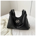Detail of black large hobo bag with silver oval logo and leather chain strap - Black