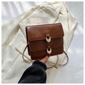Brown vintage faux leather crossbody bag with dual crescent buckles and chain strap - Brown