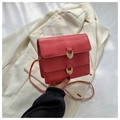 Red matte leather flap bag featuring dual gold crescent buckles and chain strap - Pink