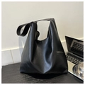 Minimalist large black faux leather tote bag with wide shoulder strap for women - Black