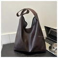 Large capacity dark brown PU leather tote bag on office desk next to laptop - Coffee