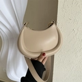 Minimalist beige crescent shoulder bag with leather finish and gold hardware details - Khaki