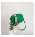 Grass green camera bag in lychee leather with a patterned woven shoulder strap - Green