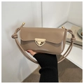 Detail of khaki leather shoulder bag featuring a gold triangle buckle and knotted strap - Khaki