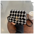Classic black and white checkered tweed crossbody bag with elegant gold teardrop lock - Black