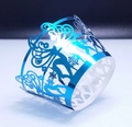 Mirror blue laser-cut cupcake wrappers with reindeer and snowflake motifs for party decor - Reflective Blue