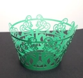 Detail view of green laser-cut cupcake wrappers with Christmas reindeer and snowflake motifs - Dark Green