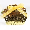 Elegant hollow laser-cut gold wedding favor box with heart patterns and yellow ribbon - Reflective Gold