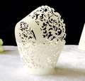 Detail of laser-cut white paper cupcake wrapper with elegant vine hollow pattern - 5*5*8CM / White