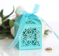 Macro detail of laser-cut candy box with elegant tiffany blue ribbon and lace pattern - Tiffany Blue