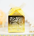 Golden laser-cut wedding favor box with butterfly pattern and elegant yellow ribbon bow - Reflective Gold