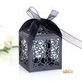 Elegant black laser-cut wedding favor gift box with ribbon and intricate hollow pattern - Black Khaki