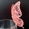 Pink laser-cut butterfly 3D wine glass card for wedding table decor on black background - Pink