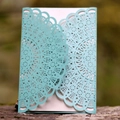 Laser cut hollow wedding invitation in light blue pearlescent paper with mandala lace pattern - Tiffany Blue