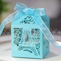 Detailed laser-cut Eiffel Tower favor box in light blue with elegant ribbon bow - Turquoise Blue