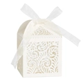 Macro view of white laser-cut floral wedding favor box with elegant organza ribbon - Ivory