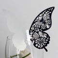 Elegant laser-cut 3D butterfly place card in black and white on a glass rim - Reflective Silver