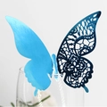 Exquisite laser cut butterfly place card with dual blue hollow lace design on wine glass - Reflective Blue