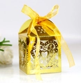 Elegant gold hollow heart-shaped gift box with decorative ribbon and floral patterns - Reflective Gold