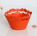Detail of orange laser-cut Halloween cupcake wrapper with festive bat pattern design - Bat Hollowed-out Style (Orange Red) / Orange Red