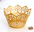 Elegant gold laser-cut cupcake wrappers with intricate lace pattern for party decoration - Gold