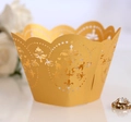 Macro view of gold pearlescent paper cupcake wrapper with laser-cut floral patterns - 5*5*8CM / Gold