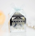Detail of silver laser-cut wedding favor box with bird cage design and blue ribbon - Reflective Silver