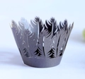 Detail view of dark grey cupcake liner with laser-cut feather lace pattern - Silver Charcoal