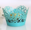 Laser cut light blue snowflake cupcake wrappers for festive wedding cake decorations - Tiffany Blue
