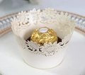 Laser-cut sunflower cupcake wrappers in cream white for elegant party dessert decoration - Ivory