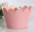 Macro shot of elegant pink scalloped cupcake wrapper with a golden chocolate ball - 5*5*8CM / Pink