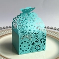 Laser-cut light blue butterfly favor box with intricate floral patterns for weddings - 50 Pieces / Tiffany Blue