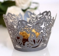 Detail of laser-cut butterfly cupcake wrappers in shimmering silver paper for weddings - 5cm / Silver Charcoal