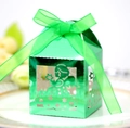 Detail of laser-cut angel baby shower favor box in metallic lime green with ribbon - Reflective Green